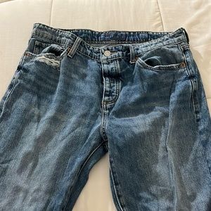 Vintage Lucky brand jeans with dark jeans patches on the knees